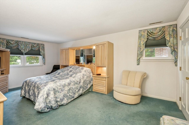 18 Banks Rd, Simsbury, CT 06070 - carpeted bedroom featuring baseboards