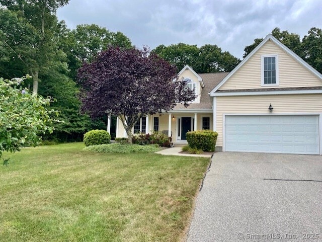 33 Regatta Dr Unit 33, East Lyme, CT 06357 - traditional home featuring driveway, a front lawn, and a garage