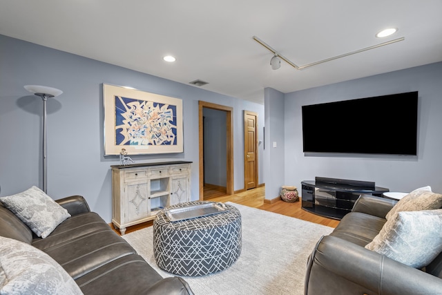 34 Joyce St, Guilford, CT 06437 - living room featuring attic access, wood finished floors, and recessed lighting