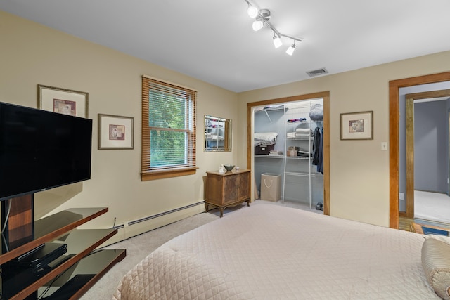 34 Joyce St, Guilford, CT 06437 - carpeted bedroom featuring baseboard heating