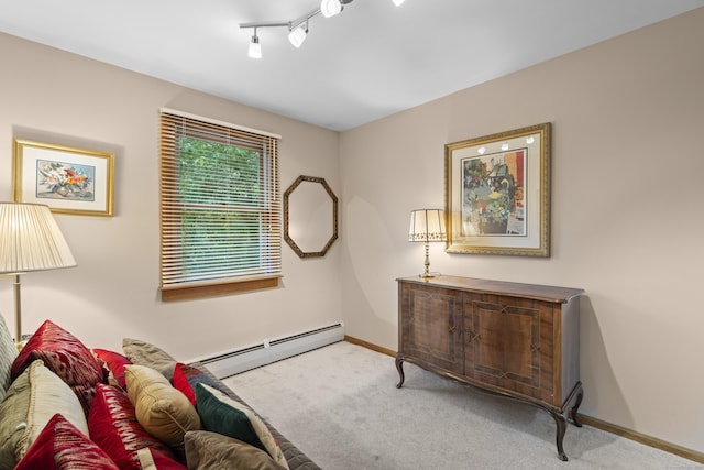 34 Joyce St, Guilford, CT 06437 - carpeted living room with a baseboard radiator and baseboards