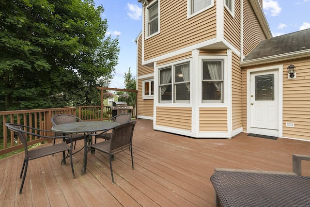 34 Joyce St, Guilford, CT 06437 - wooden deck featuring outdoor dining area