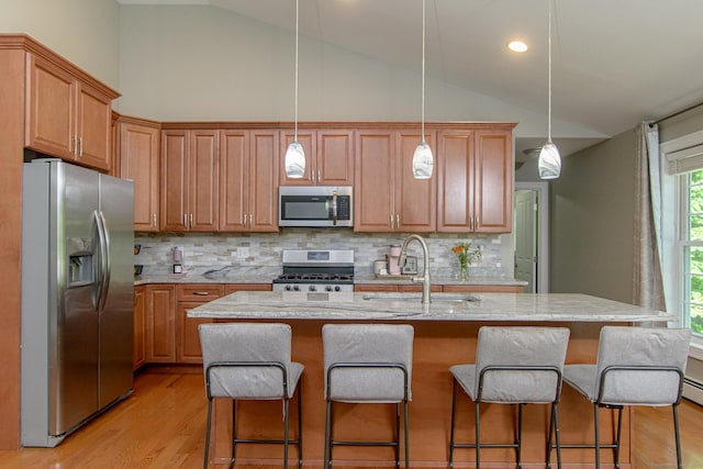 40 Airport Rd, Killingly, CT 06239 - kitchen featuring appliances with stainless steel finishes, decorative backsplash, light wood-type flooring, light stone counters, and recessed lighting
