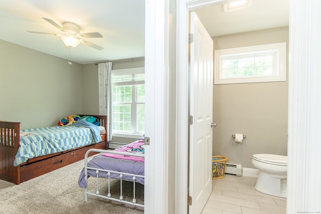 40 Airport Rd, Killingly, CT 06239 - bedroom featuring a baseboard radiator, ensuite bath, and ceiling fan