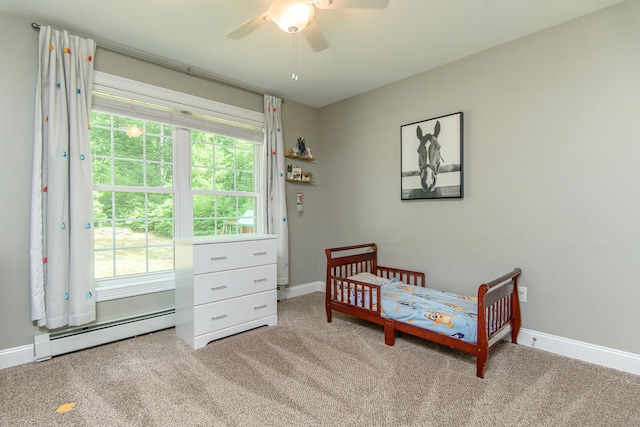 40 Airport Rd, Killingly, CT 06239 - carpeted bedroom with a baseboard radiator and a ceiling fan