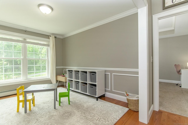 40 Airport Rd, Killingly, CT 06239 - game room with crown molding, wood finished floors, and baseboard heating