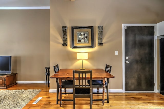 53 Canner St Apt 2, New Haven, CT 06511 - dining space featuring hardwood / wood-style floors and crown molding