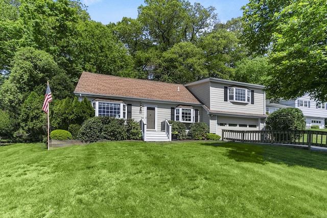 210 Carroll Rd, Fairfield, CT 06824 - tri-level home featuring a garage