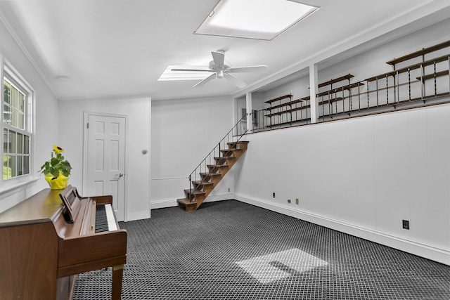 210 Carroll Rd, Fairfield, CT 06824 - basement featuring carpet floors, a ceiling fan, and stairs