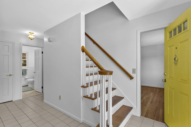 210 Carroll Rd, Fairfield, CT 06824 - stairs with tile patterned floors and baseboards