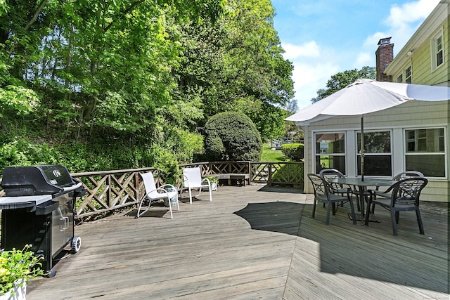 210 Carroll Rd, Fairfield, CT 06824 - wooden terrace with grilling area and outdoor dining space