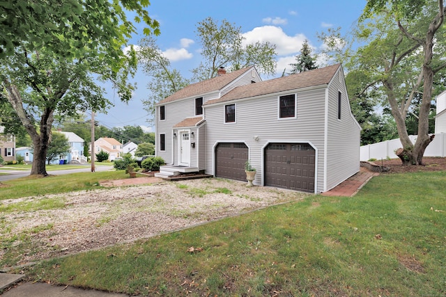 162 Sheppard St, Stratford, CT 06614 - traditional-style house featuring a garage, driveway, a chimney, and a shingled roof