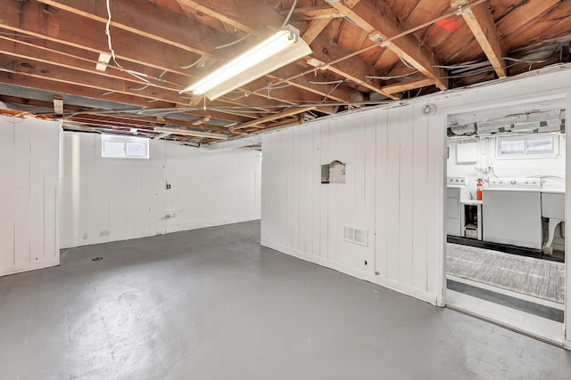 162 Sheppard St, Stratford, CT 06614 - basement with washing machine and clothes dryer