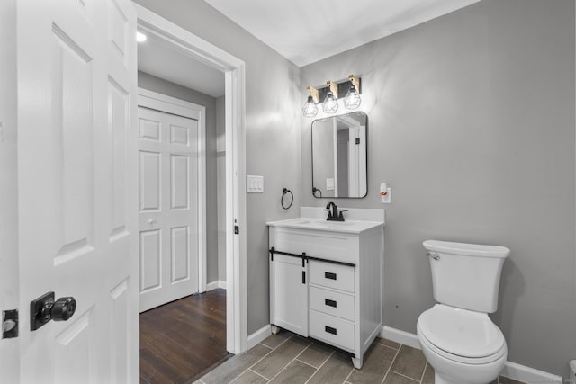 36 Greenfield St, Windsor, CT 06095 - bathroom featuring vanity and wood finished floors