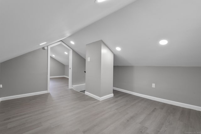 36 Greenfield St, Windsor, CT 06095 - bonus room with wood finished floors, lofted ceiling, and recessed lighting