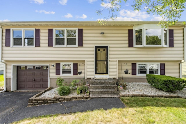 83 Julia Ter, Middletown, CT 06457 - bi-level home with a garage and asphalt driveway