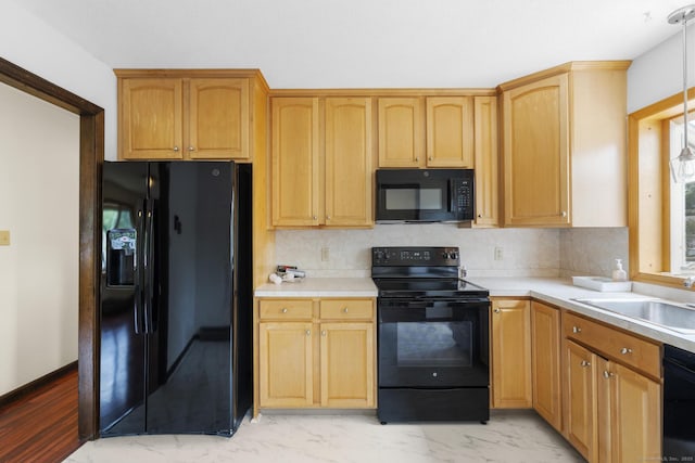 83 Julia Ter, Middletown, CT 06457 - kitchen featuring black appliances, light countertops, decorative backsplash, and light marble finish floors