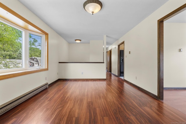 83 Julia Ter, Middletown, CT 06457 - unfurnished room with a baseboard radiator and wood finished floors