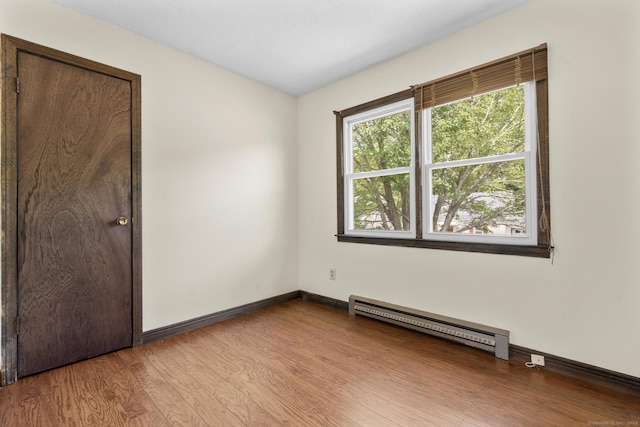 83 Julia Ter, Middletown, CT 06457 - spare room with baseboard heating and wood finished floors