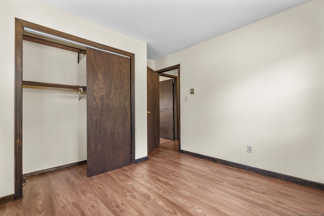 83 Julia Ter, Middletown, CT 06457 - unfurnished bedroom featuring wood finished floors and a closet
