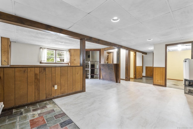 83 Julia Ter, Middletown, CT 06457 - below grade area featuring wood walls and a wainscoted wall