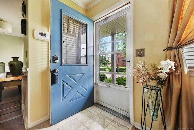718 Cove Rd Apt 3, Stamford, CT 06902 - entryway with healthy amount of natural light, crown molding, and light tile patterned floors