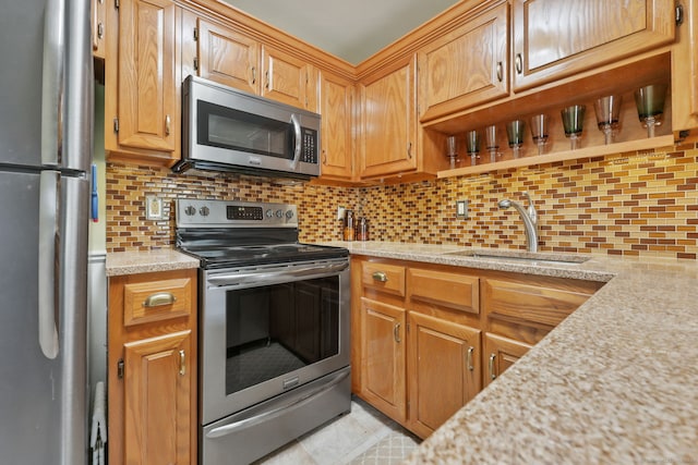718 Cove Rd Apt 3, Stamford, CT 06902 - kitchen with stainless steel appliances, light countertops, tasteful backsplash, and open shelves