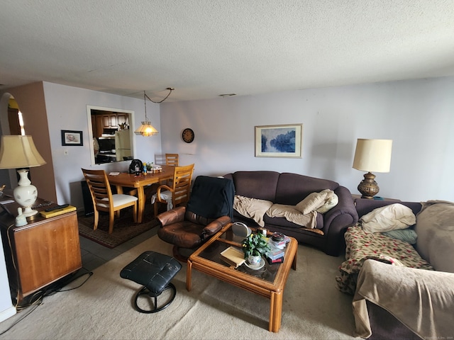 2390 State St Apt 7D, Hamden, CT 06517 - living area featuring a textured ceiling