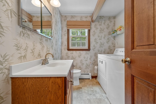 70 Brighton Rd, Hebron, CT 06248 - bathroom with separate washer and dryer, a baseboard radiator, vanity, and wallpapered walls