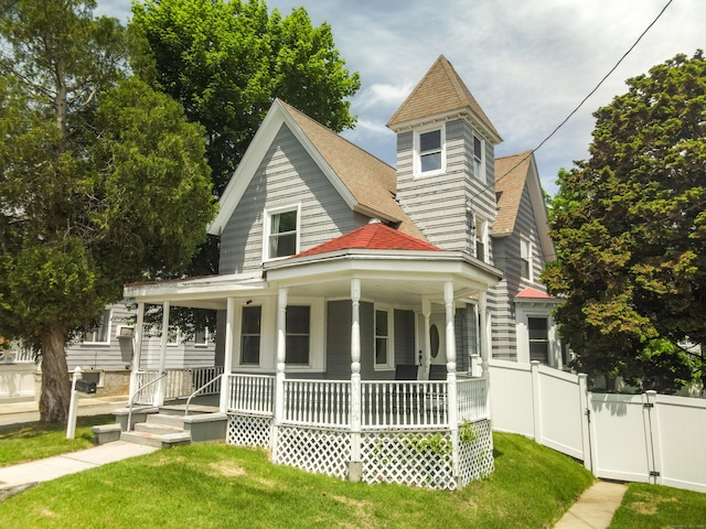 163 Willetts Ave, New London, CT 06320 - victorian house featuring a porch, a shingled roof, and a gate