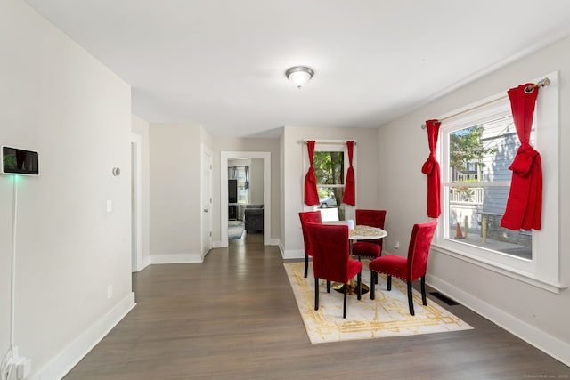 163 Willetts Ave, New London, CT 06320 - dining space with plenty of natural light and wood finished floors