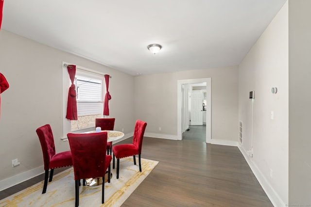 163 Willetts Ave, New London, CT 06320 - dining space featuring baseboards and wood finished floors