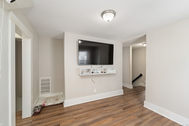 163 Willetts Ave, New London, CT 06320 - unfurnished living room featuring wood finished floors