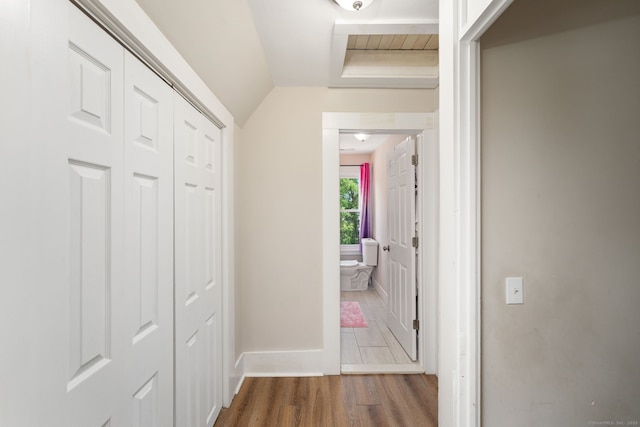 163 Willetts Ave, New London, CT 06320 - corridor featuring wood finished floors and vaulted ceiling