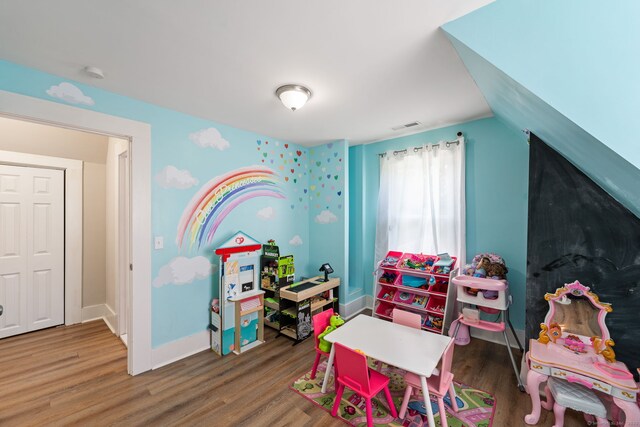 163 Willetts Ave, New London, CT 06320 - recreation room with wood finished floors and baseboards