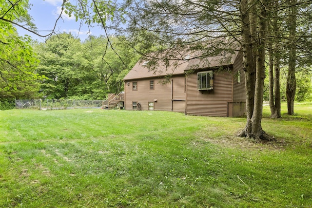 64 Iron St, Ledyard, CT 06339 - view of green lawn with stairway and a wooden deck
