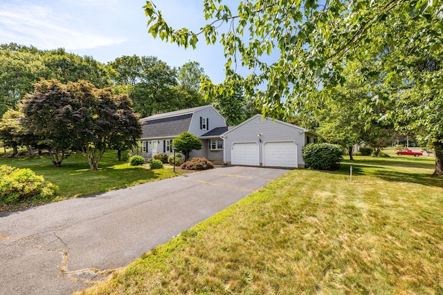 10 Empire Way, Bristol, CT 06010 - dutch colonial with a gambrel roof, a garage, driveway, and a front lawn