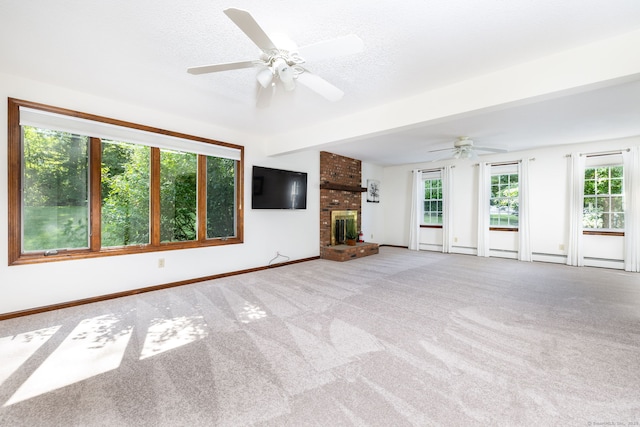 10 Empire Way, Bristol, CT 06010 - unfurnished living room with carpet, ceiling fan, and a fireplace
