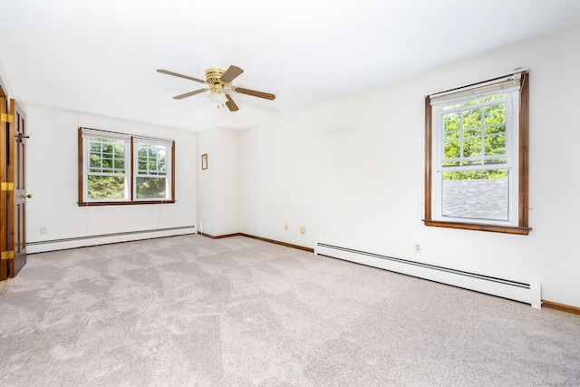 10 Empire Way, Bristol, CT 06010 - empty room featuring a baseboard heating unit, a ceiling fan, and carpet
