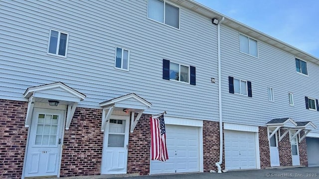 view of home's exterior with brick siding