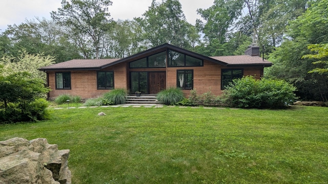 47 Chestnut Hill Rd, Stamford, CT 06903 - view of front of house featuring a chimney and a front lawn