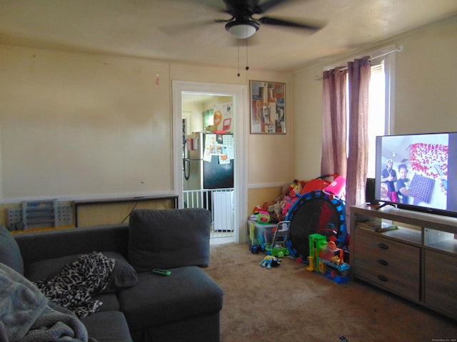 69 W Liberty St, Waterbury, CT 06706 - carpeted living room featuring ceiling fan and radiator heating unit