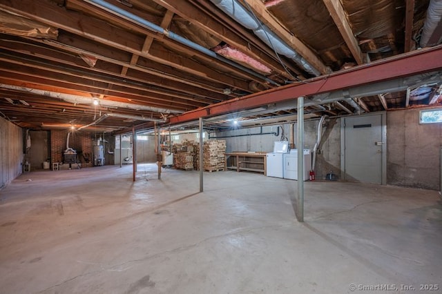 151 Timber Trl, East Hartford, CT 06118 - unfinished basement featuring independent washer and dryer and water heater