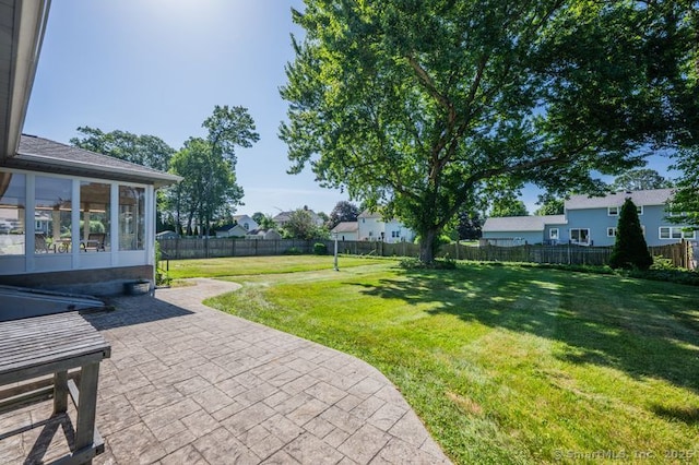151 Timber Trl, East Hartford, CT 06118 - fenced backyard featuring a patio area and a sunroom