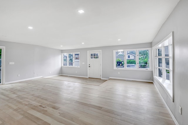 34 2nd Ave, East Haven, CT 06512 - unfurnished living room featuring light wood finished floors and recessed lighting