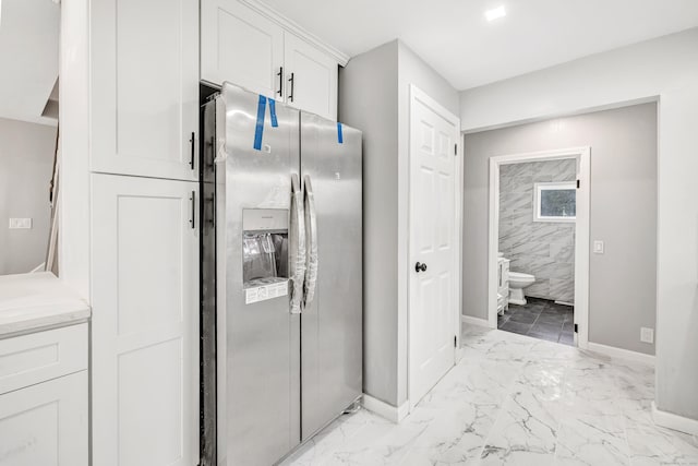 34 2nd Ave, East Haven, CT 06512 - bathroom with baseboards and marble look tile flooring