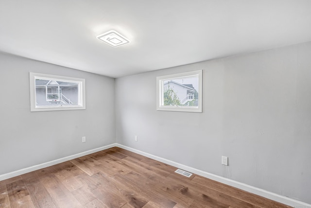 34 2nd Ave, East Haven, CT 06512 - unfurnished room featuring wood finished floors and baseboards