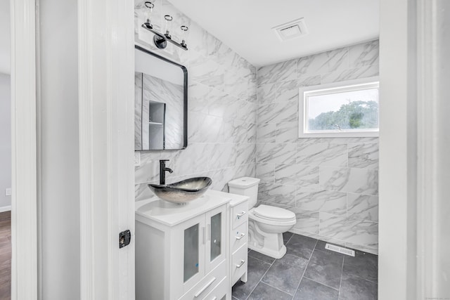 34 2nd Ave, East Haven, CT 06512 - half bathroom featuring vanity and tile walls