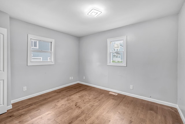 34 2nd Ave, East Haven, CT 06512 - spare room featuring hardwood / wood-style flooring