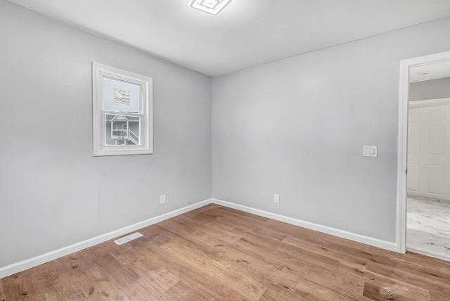 34 2nd Ave, East Haven, CT 06512 - spare room featuring baseboards and light wood-style flooring